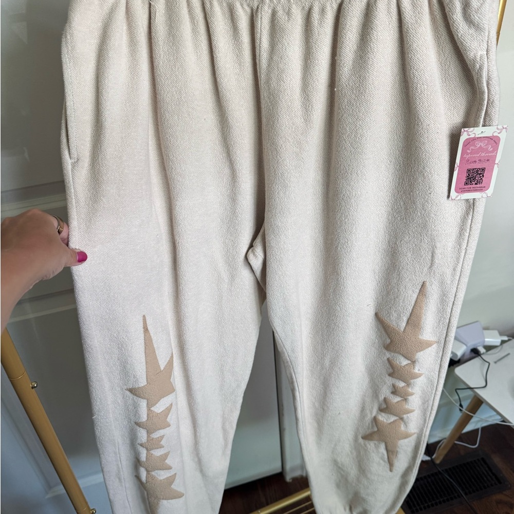 LONELY GHOST Cream Joggers with Star Cutouts
